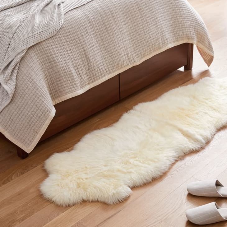 https://cdn.apartmenttherapy.info/image/upload/f_auto,q_auto:eco,w_730/gen-workflow%2Fproduct-database%2Fsheepskin-rug-west-elm