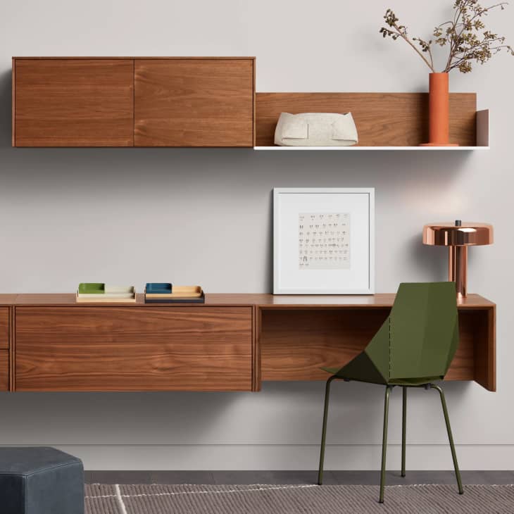 Wall mounted floating desk deals with storage