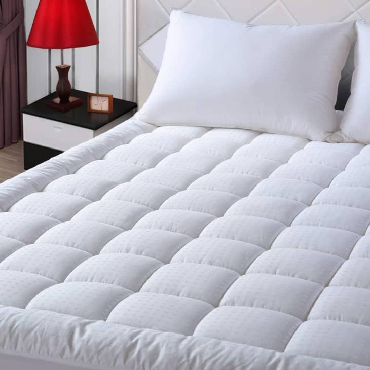Half pillow top mattress pad top
