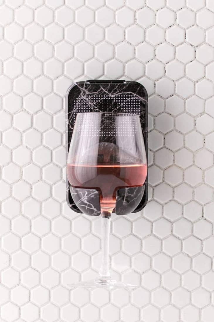 This 30 Waterproof Speaker and Wine Holder Just Made Bath Time So Much Better Apartment Therapy