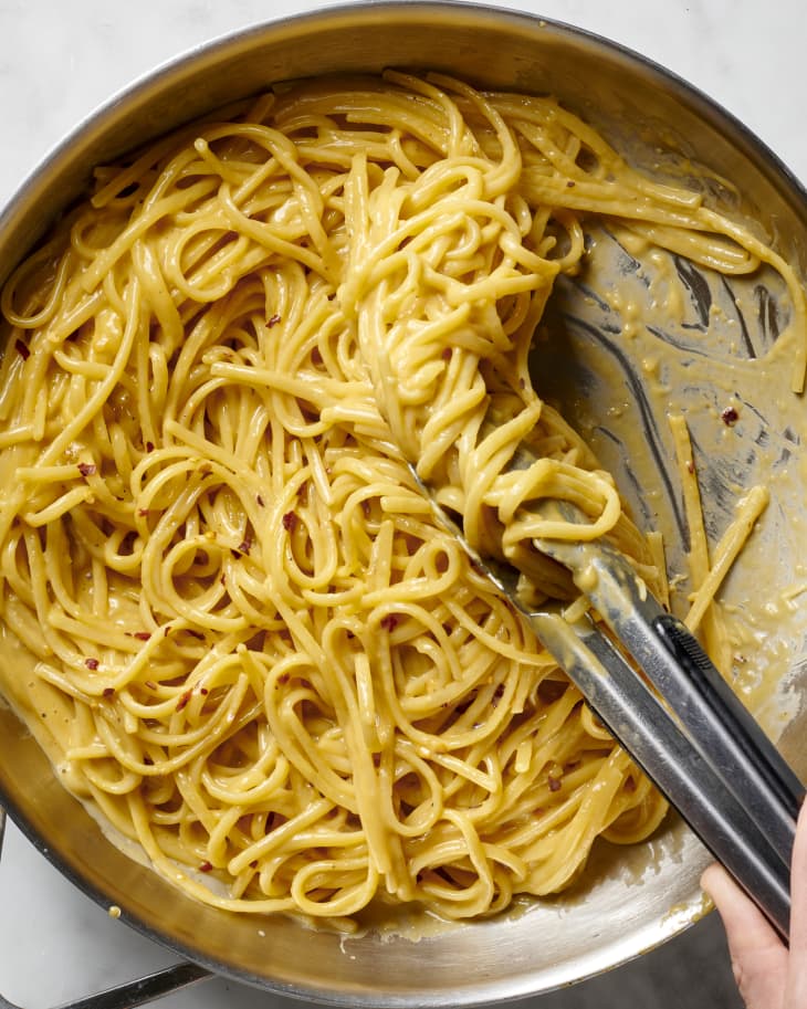 anchovy carbonara pasta dish in a skillet