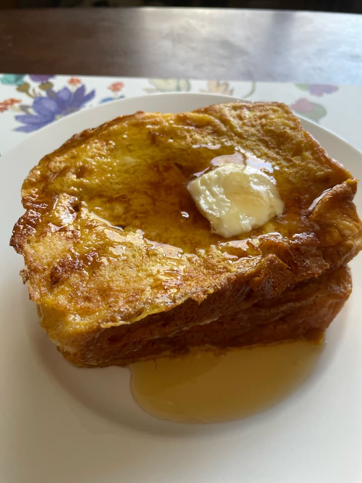 Two pieces of french toast stacked on top of one another