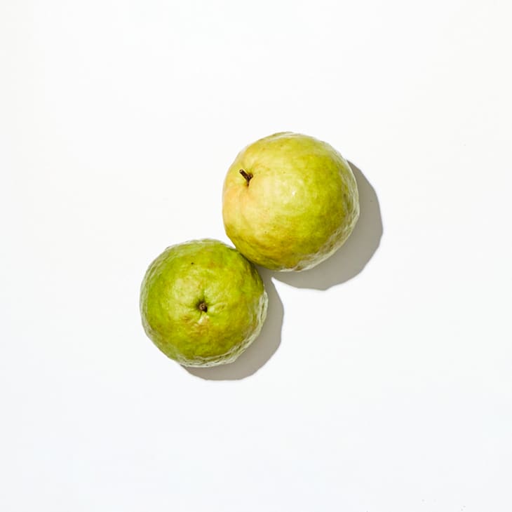 Guava on a white surface.