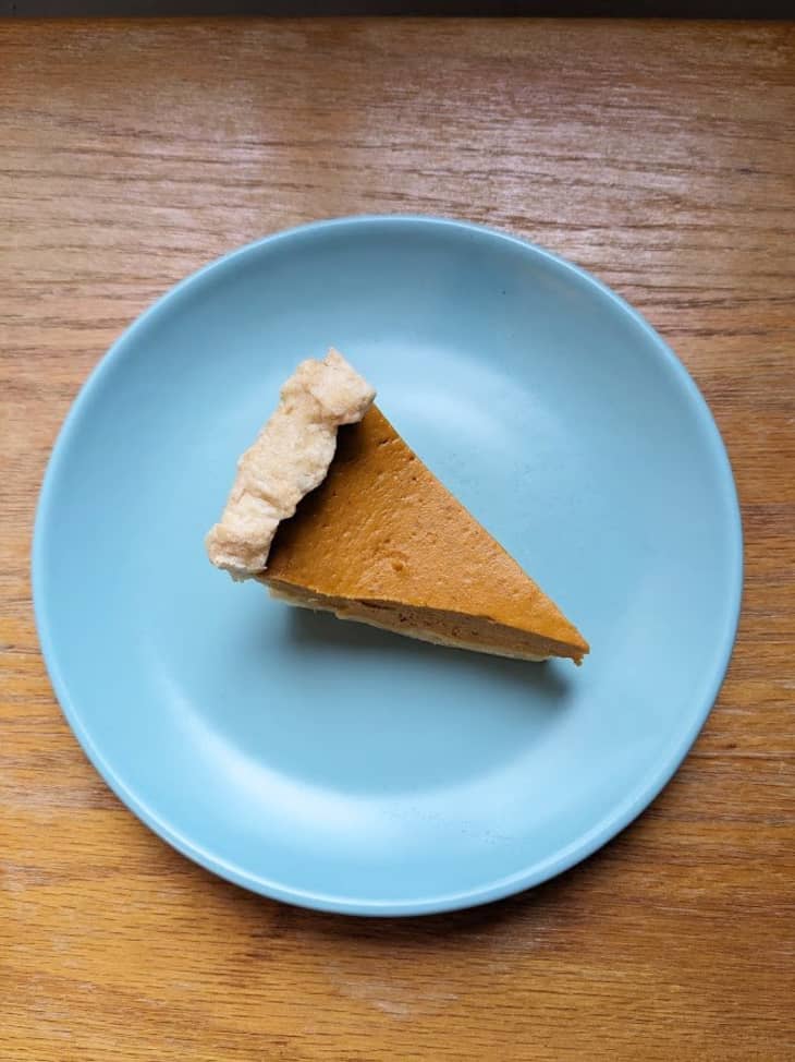 piece of pumpkin pie on blue plate