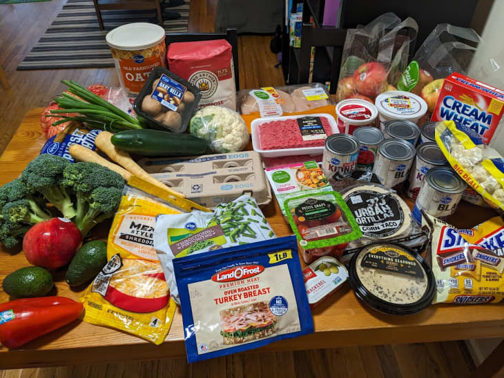 table with grocery haul displayed