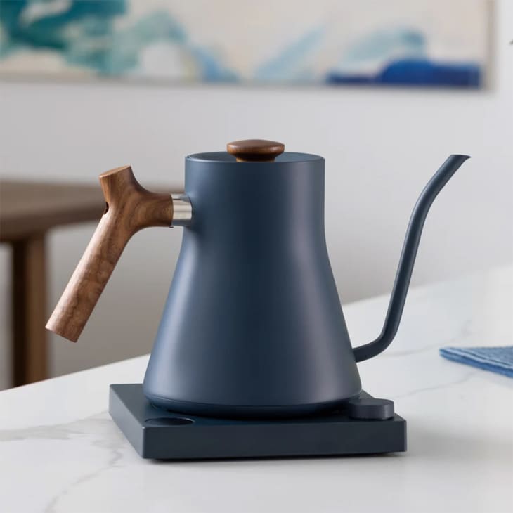 dark blue electric kettle with wood handle