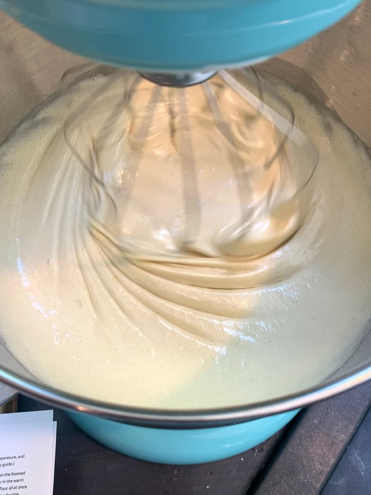 brownie batter mixing in a stand mixer