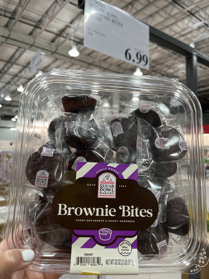 brownie bites, clear plastic square container, price tag above