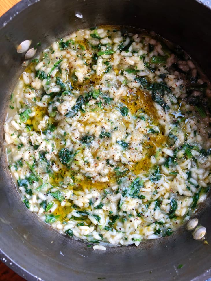 spinach risotto cooking in pot