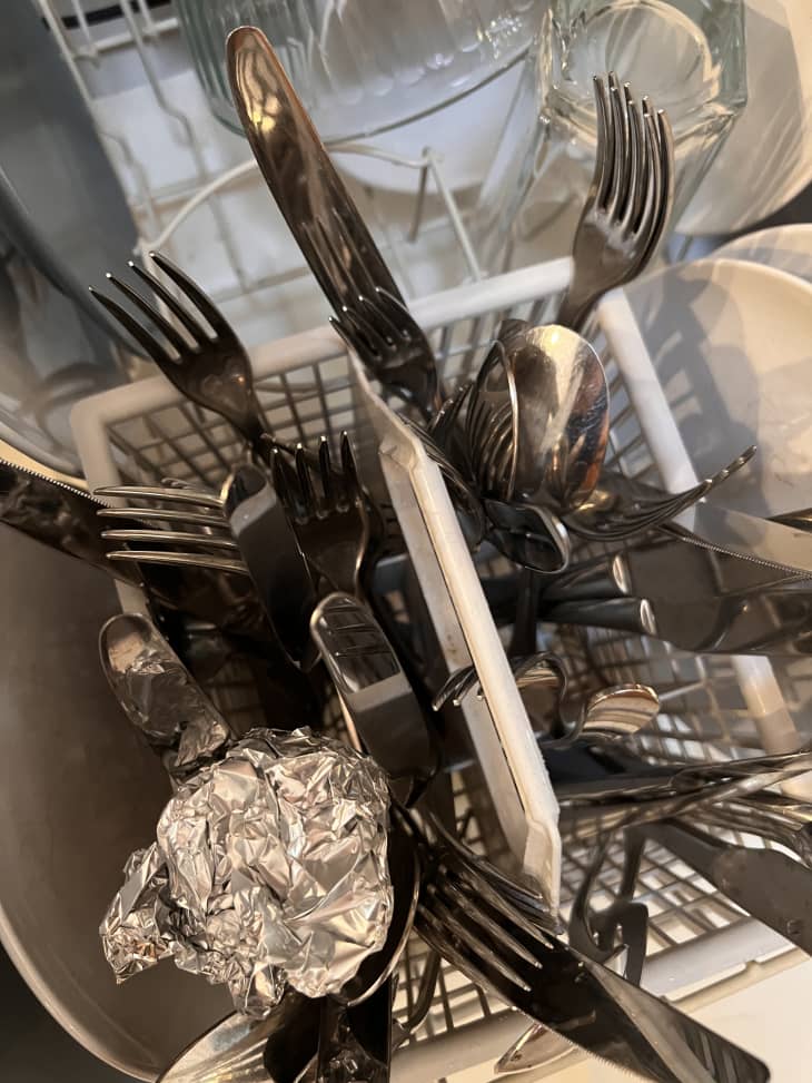 Use a Ball of Aluminum Foil in Your Dishwasher for Shiny Silverware Cubby