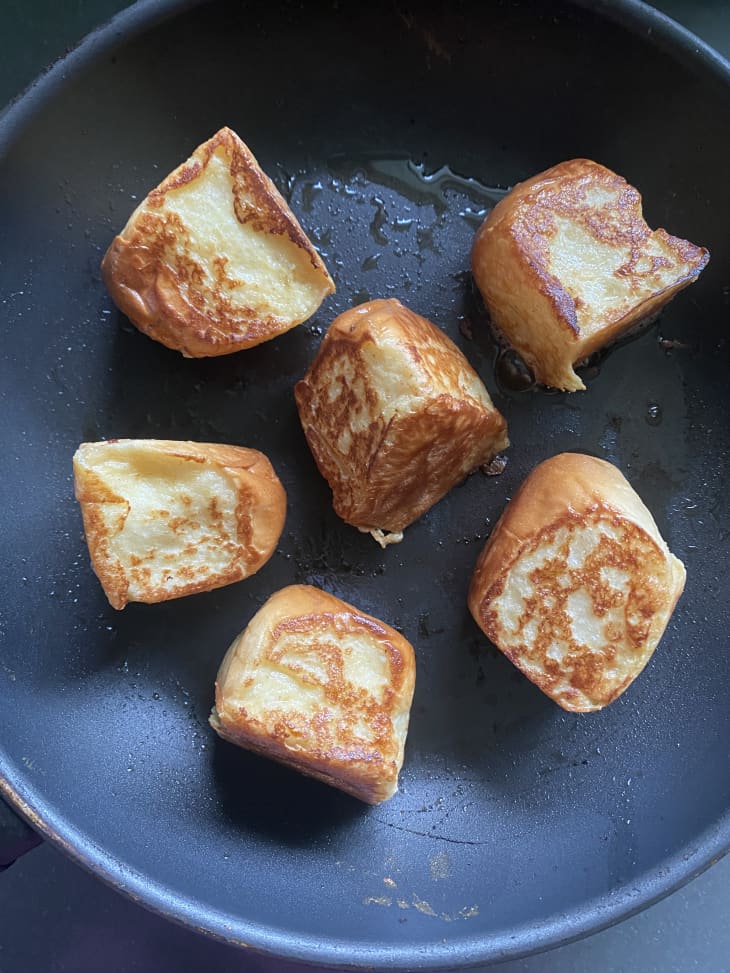 Photograph of Hawaiian roll french toast in pan
