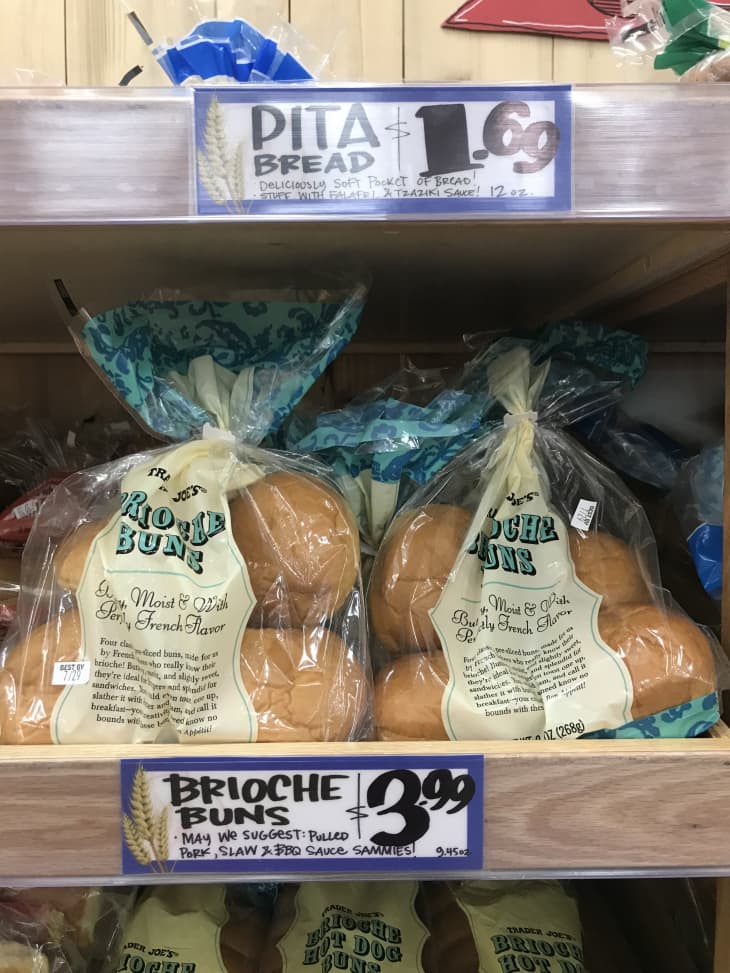 bags of Trader Joe's brioche buns on store shelf