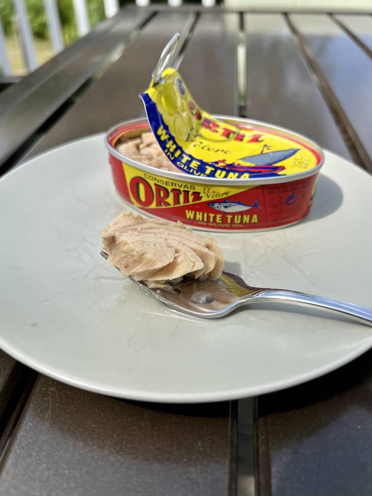 Ortiz canned tuna on plate next to tuna on fork