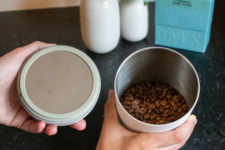 coffee beans inside a Fellow Atmos container plus lid
