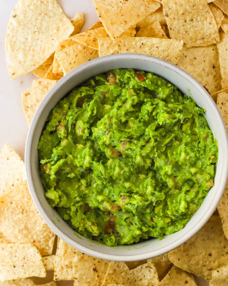Photo of guacamole with tortilla chips.