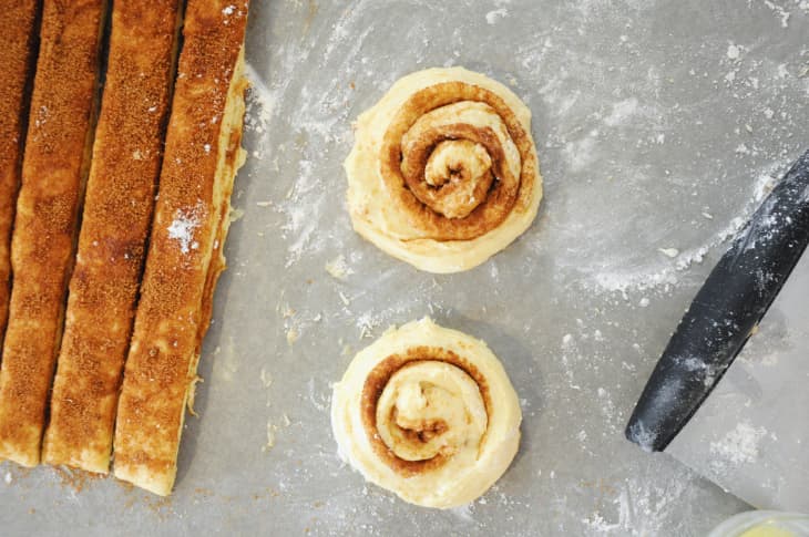 cinnamon roll dough - some in strips, some rolled