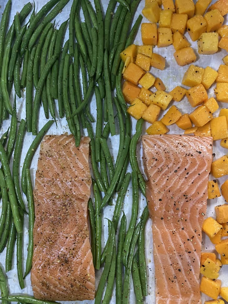green beans, salmon, and squash on sheet pan
