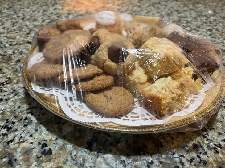 plate of cookies covered with transparent shower cap