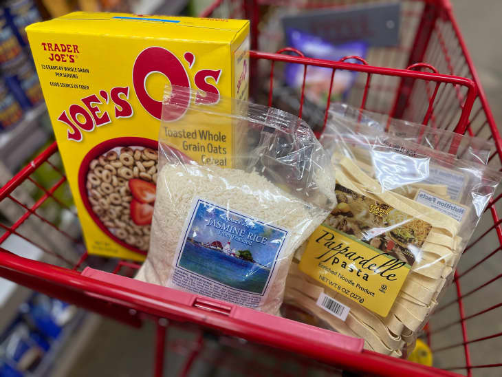 Cereal, rice and pasta in a Trader Joe's shopping cart.