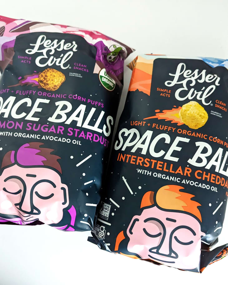 Lesser evil space balls snacks on white background.