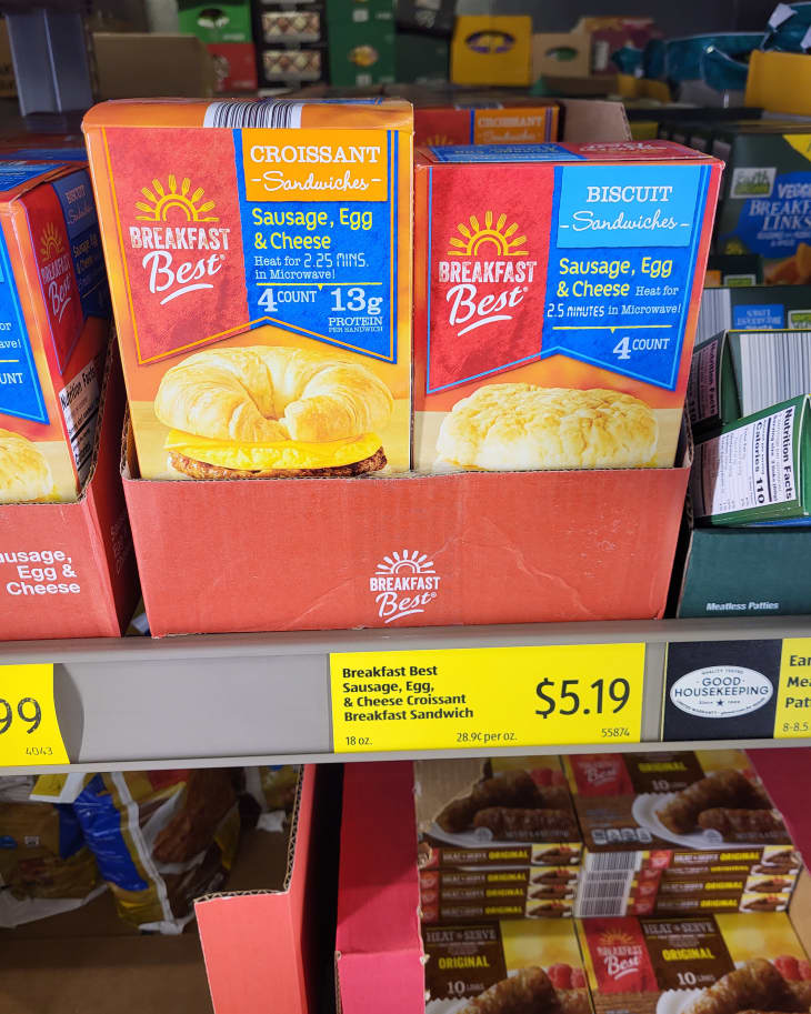 Aldi shelves with boxes of Breakfast Best Croissant Sandwiches, Sausage, Egg &amp; Cheese flavor