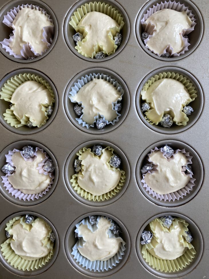 Cupcake batter in liners and cupcake tin