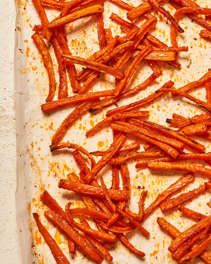 Homemade carrot fries on parchment