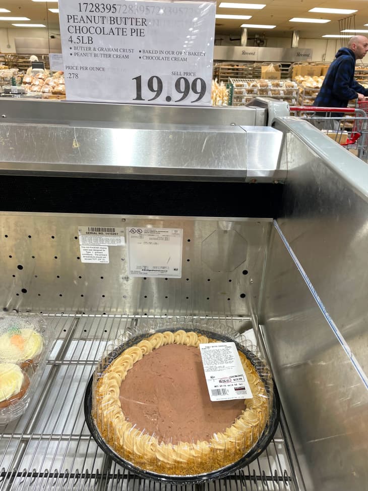 Costco Peanut Butter pie in store display case.
