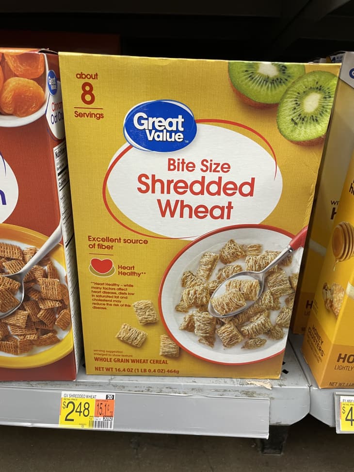 Box of Shredded Wheat cereal on shelf.