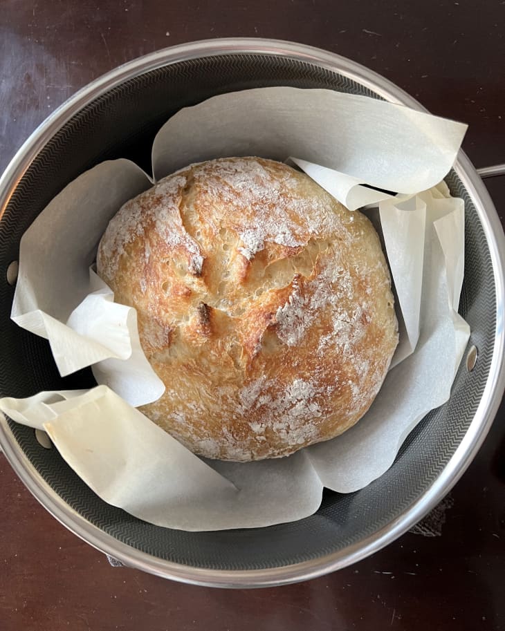 baked bread wrapped in parchment in HexClad 5-qt Dutch Oven