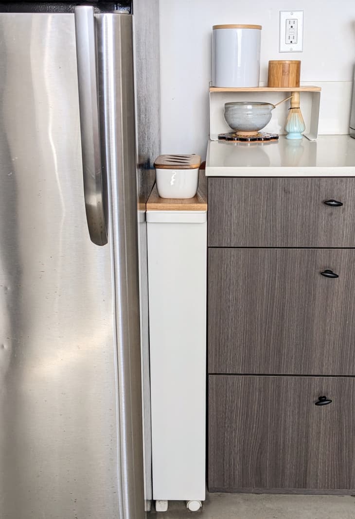 LDA rolling cart in small space between refrigerator and kitchen countertops.