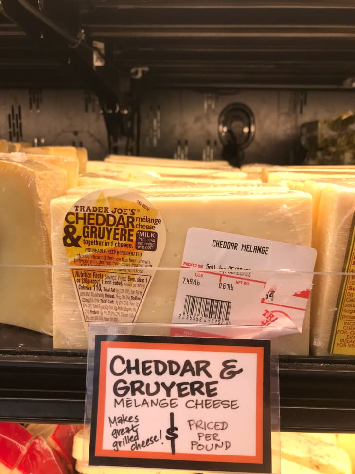 Trader Joe's cheddar and gruyere cheese in store.