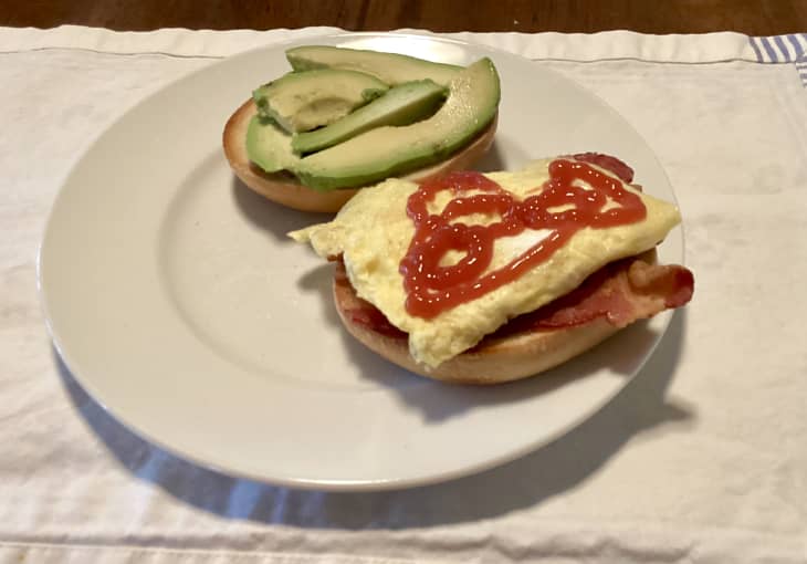 Grocery diary meal: bagel sandwich with avocado and agg