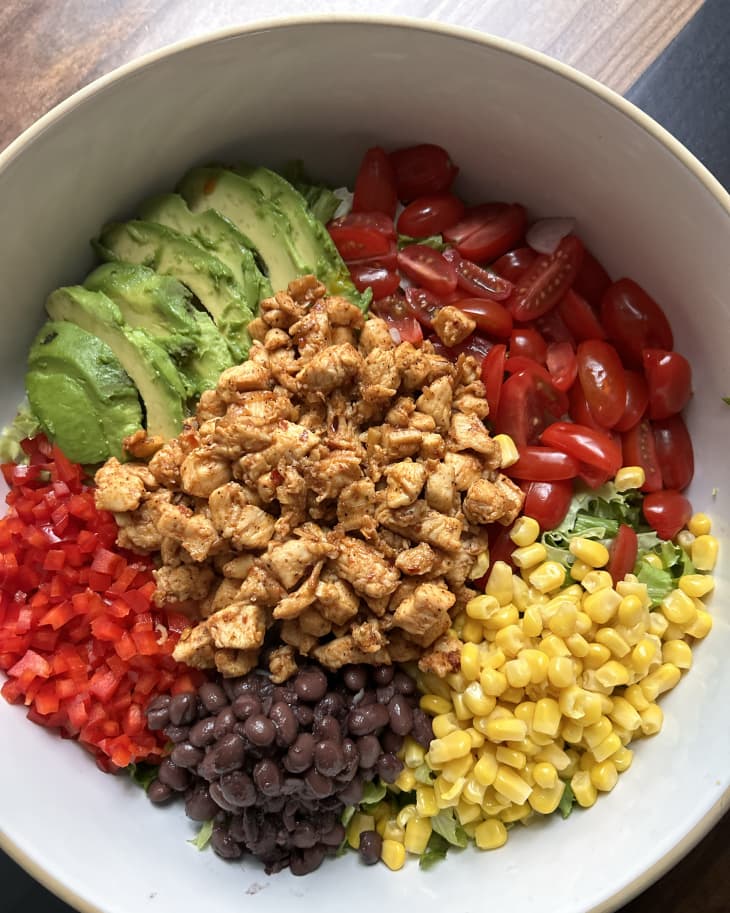 diced and prepped ingredients in bowl for spicy southwest salad