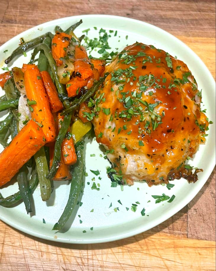 chicken meatloaf with green beans and carrots on plate. meal kit from marley spoon, martha stewart box