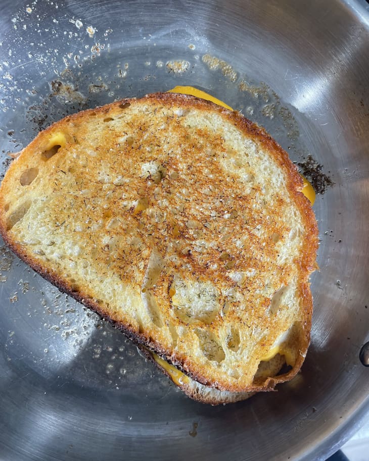 grilled cheese sandwich grilling in pan