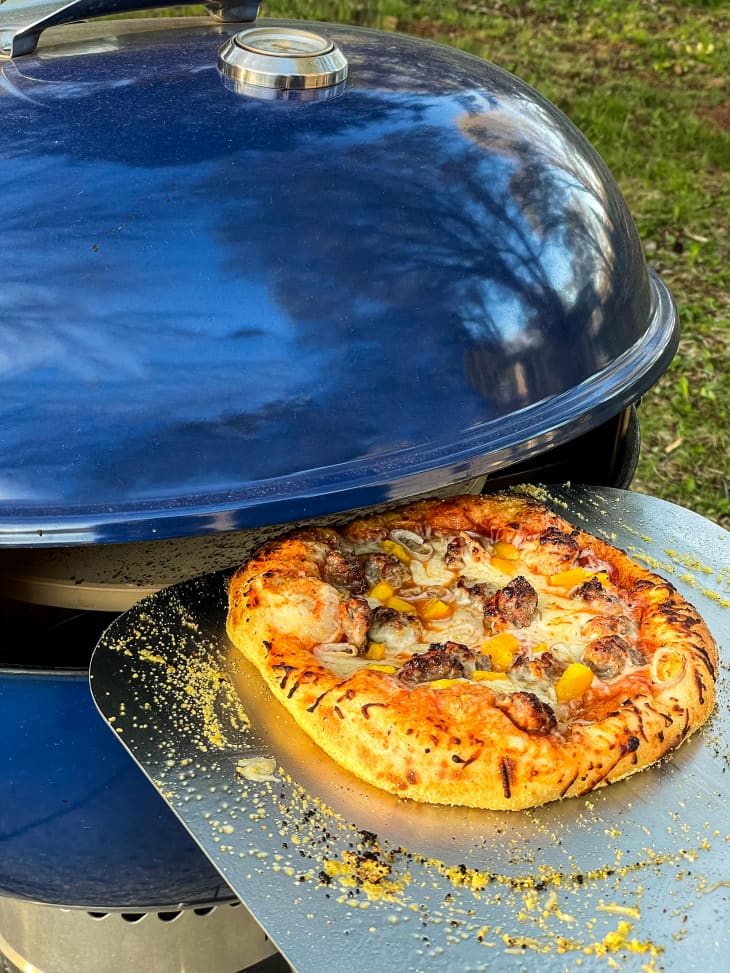 Pizzacraft PC7001 PizzaQue Deluxe Outdoor Pizza Oven Conversion Kit in use outdoors