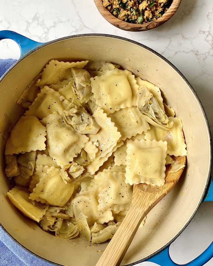 Overhead photo of Ravioli with Artichokes in a pot before adding Garlic Breadcrumbs