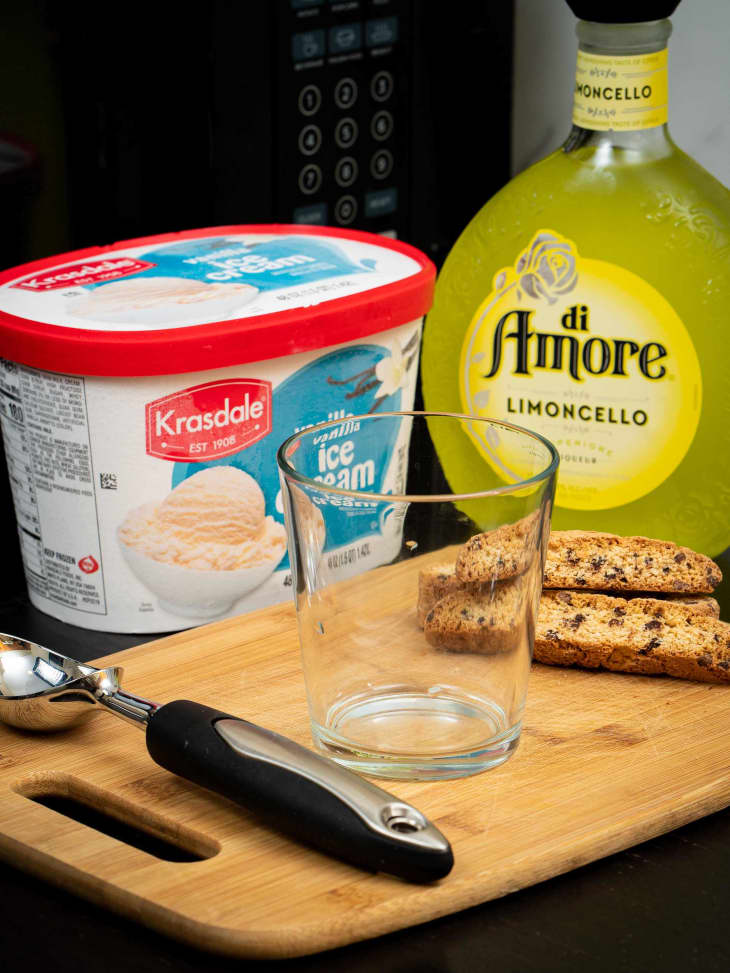di Amori limoncello, Krasdale ice cream, biscotti and an empty glass on cutting board