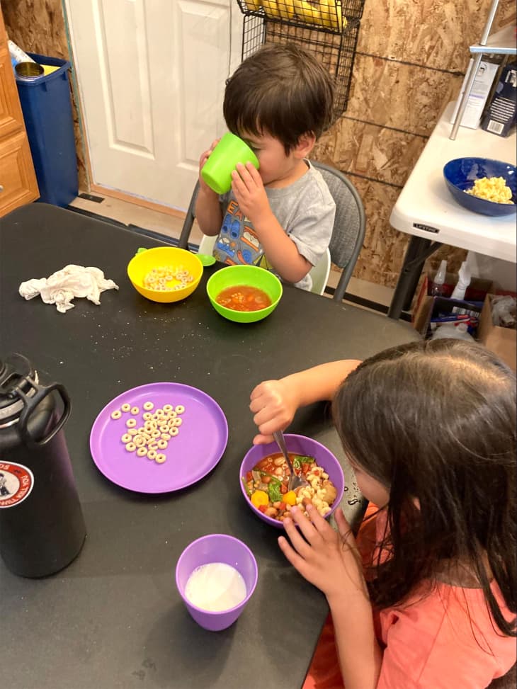 Kids eating cereal.