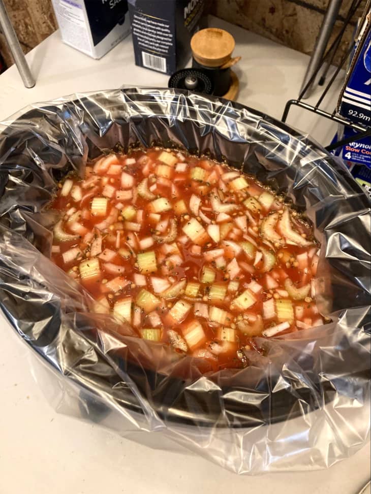 Celery, onion and tomato in slow cooker.