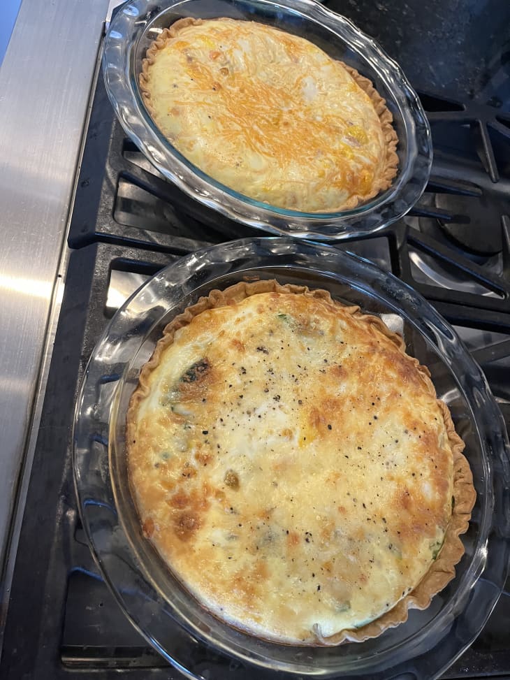 2 quiches sitting on stove