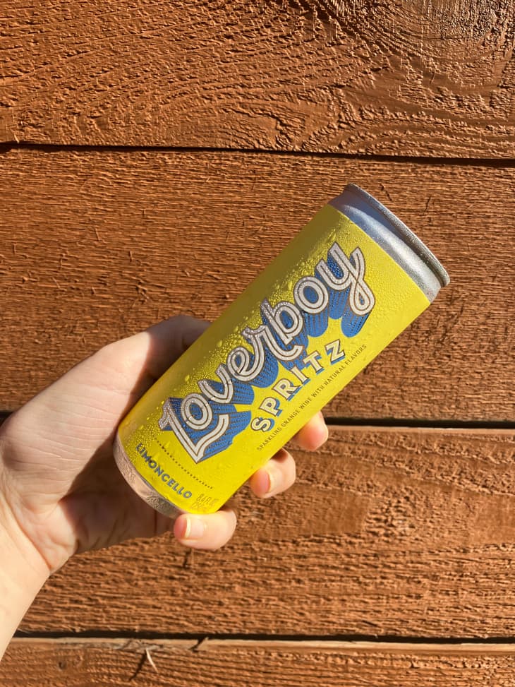 Someone holding can of Loverboy Spritz.