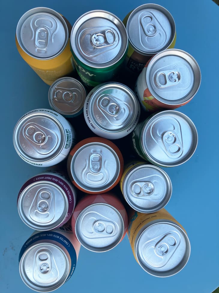 Top view of a variety of canned cocktails.
