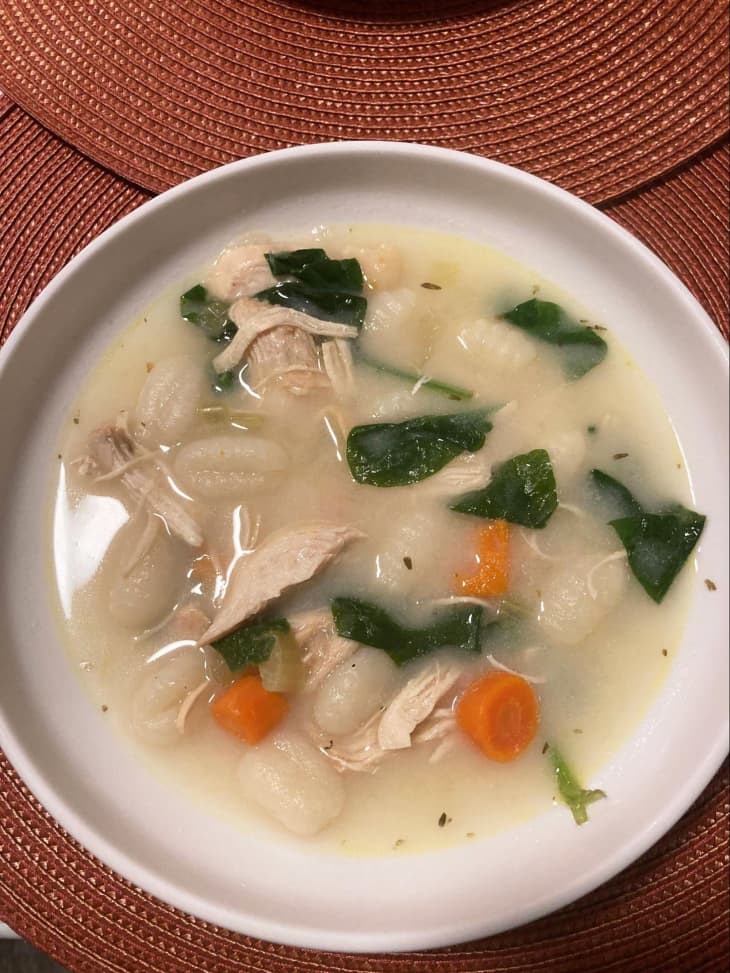 Chicken and gnocchi soup in bowl.