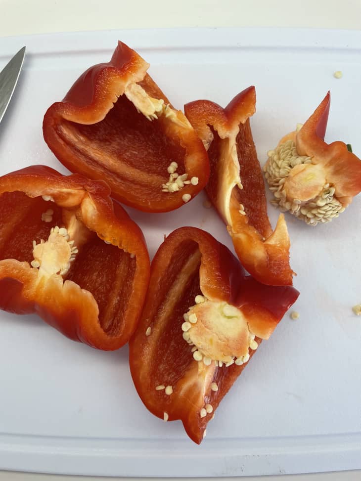 red bell pepper, cut in fourths, seeds, quarters of a bell pepper