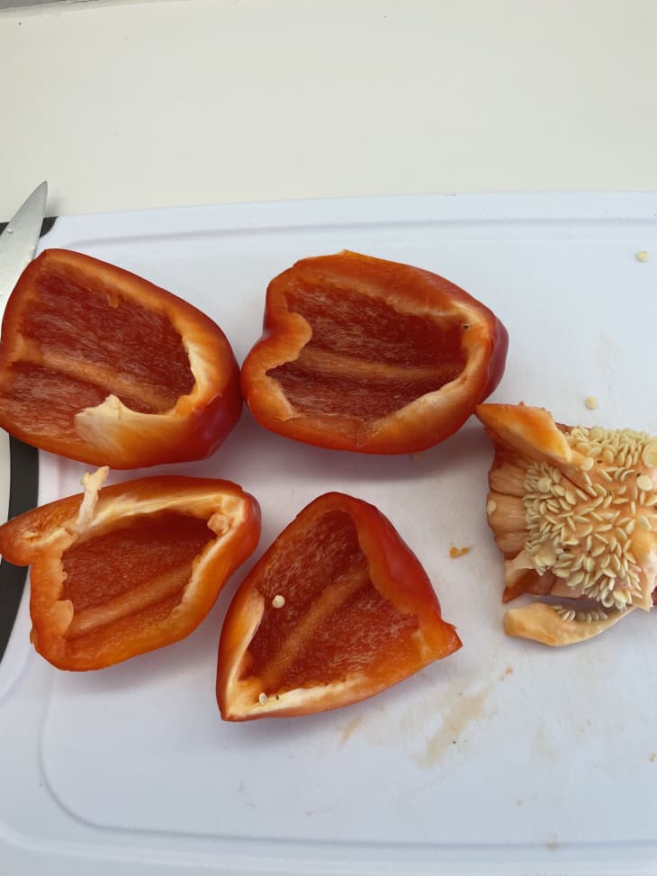 red bell pepper, cut in fourths, seeds, quarters of a bell pepper