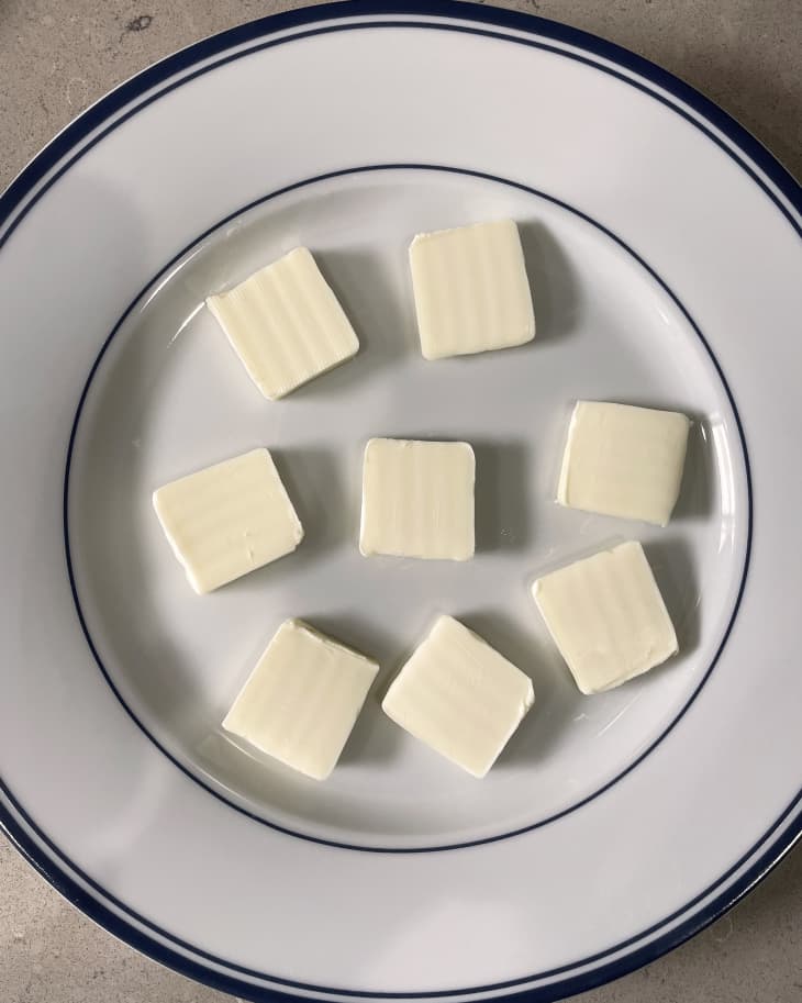 blocks of butter for fettucine alfredo serving on a plate