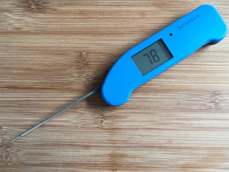 Thermoworks thermapen on wooden surface.