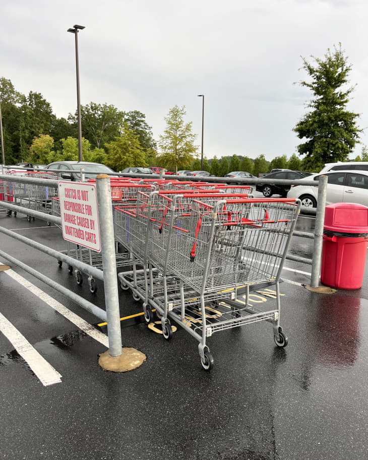 Shopping carts in designated cart area in parking lot of Costco store